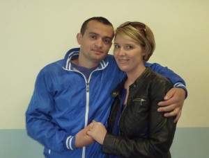 Mark Marku holds Julie Markus hand